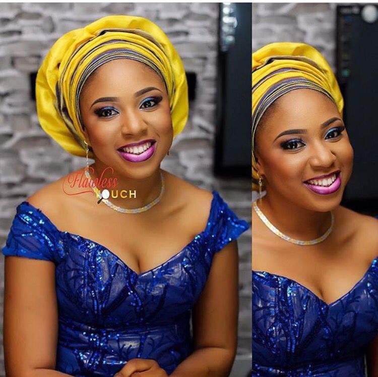 Navy blue lace and gold gele