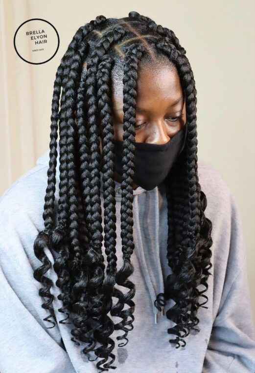Big knotless braids with curly ends