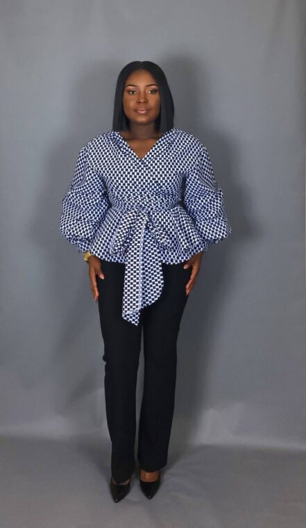 A flowy Ankara blouse paired with black trousers