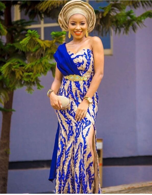 Blue Lace Gown with a Gold Gele