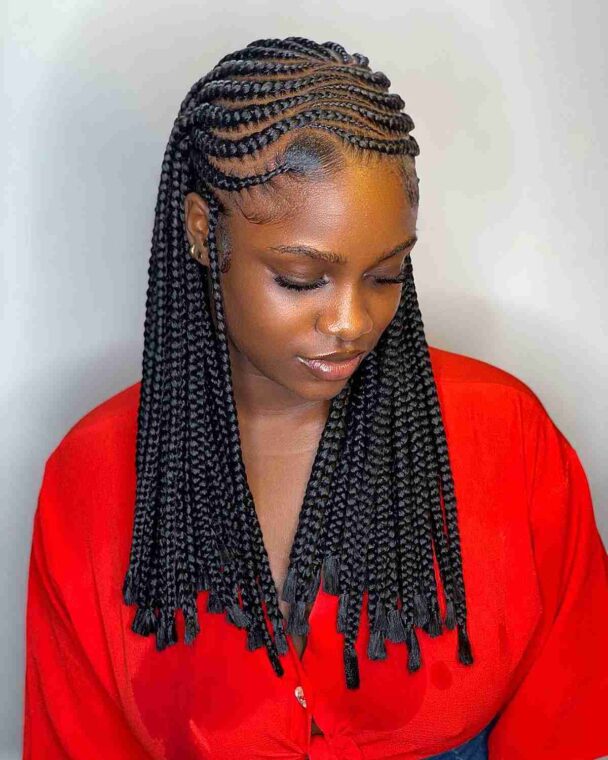 Black stitch braids with wavy partings