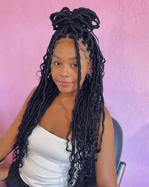 Crochet Faux Locs with Curly Ends and a High Bun